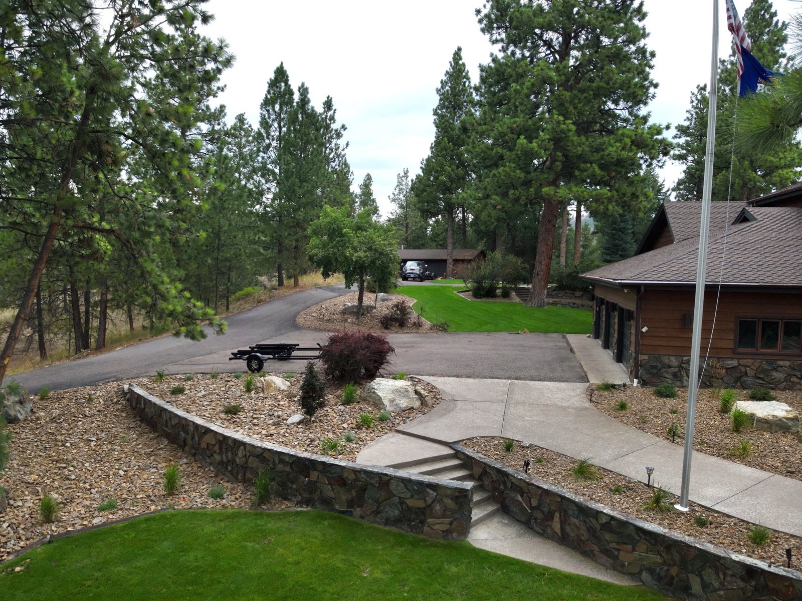 American flag at Eagle's Bluff private peninsula estate on Flathead Lake