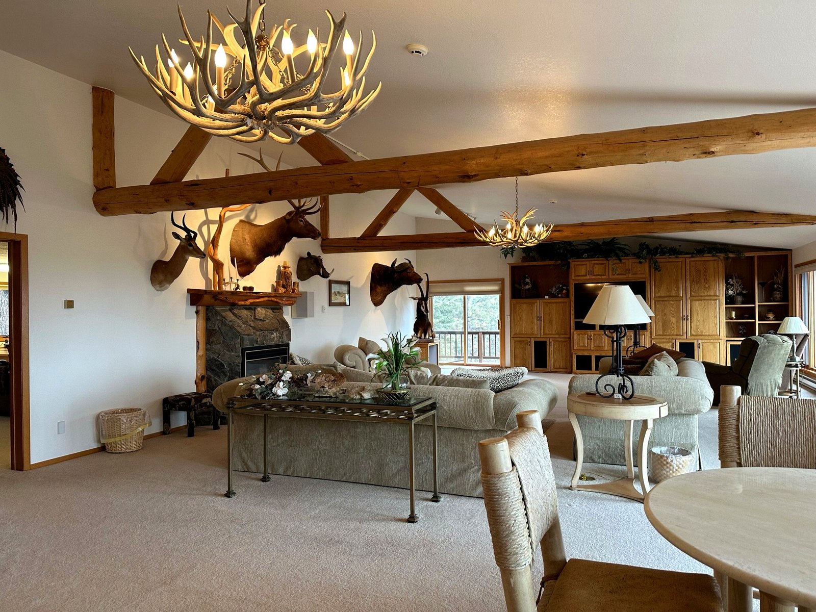 Upper living room with vaulted ceilings and Flathead Lake views at Eagle's Bluff