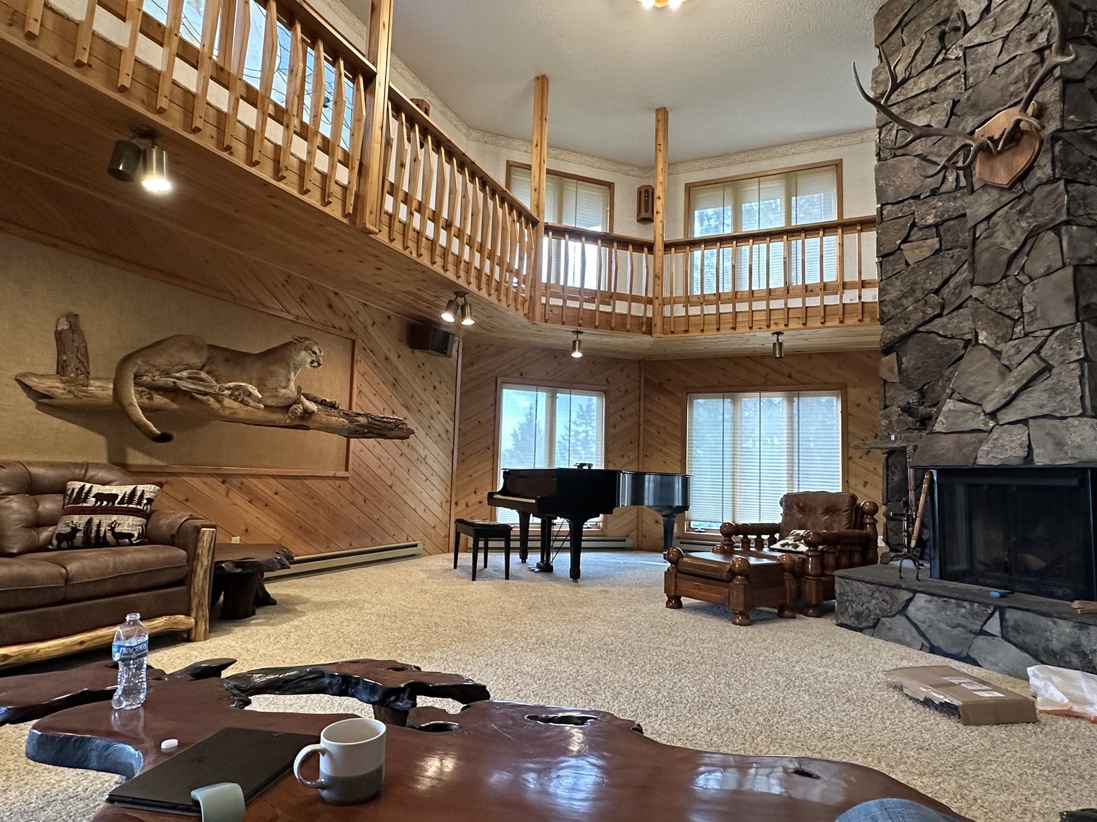 Grand dual staircase entrance at Eagle's Bluff Main House luxury estate