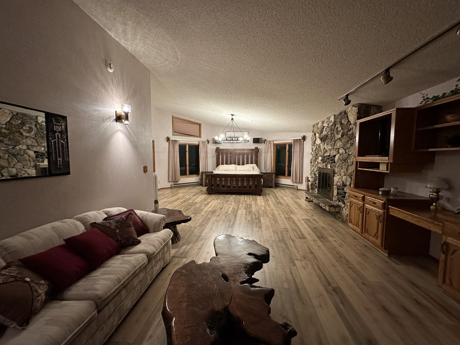 Indoor pool area with waterslide and diving board at Eagle's Bluff estate on Flathead Lake
